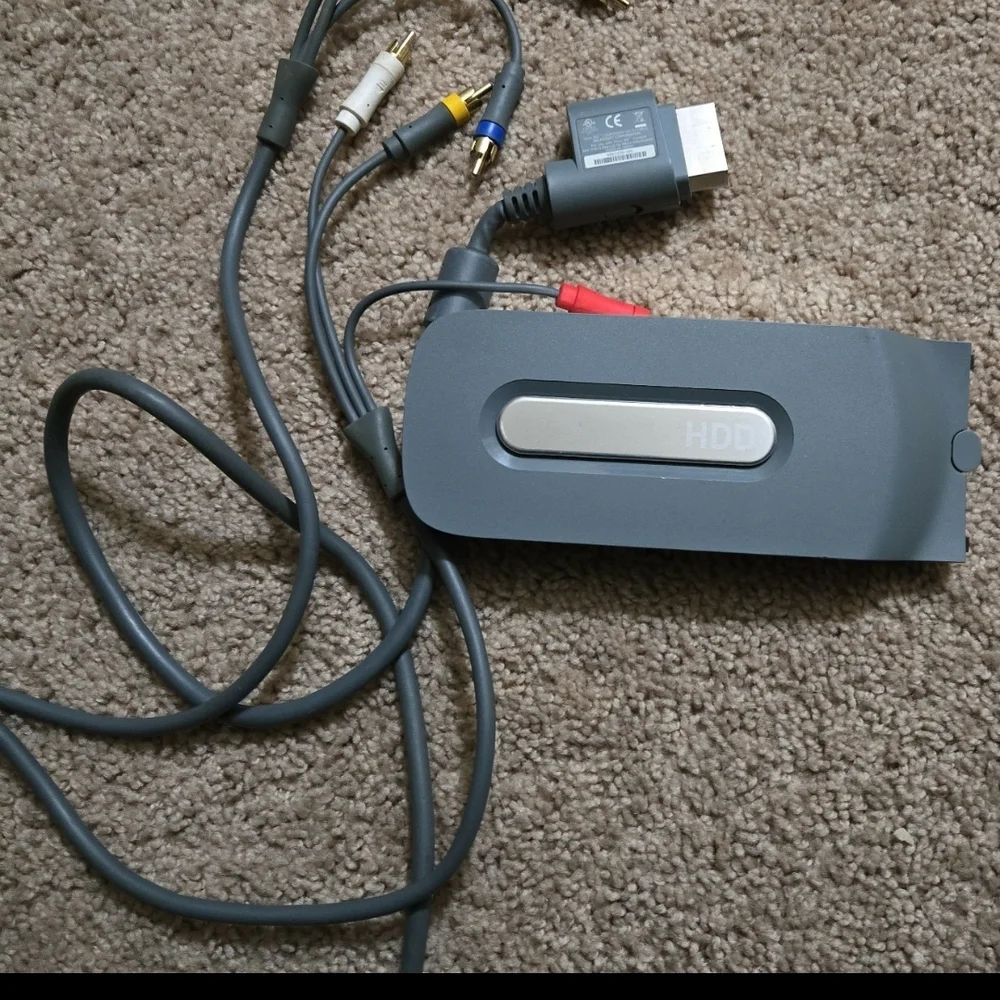 Av cables and 4gb hard drive for xbox 360, tested working.